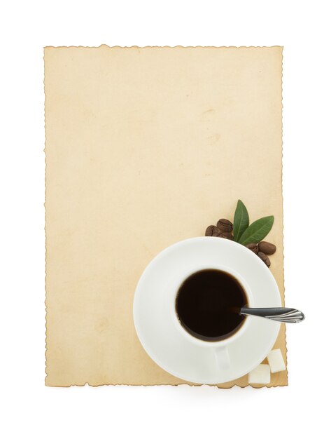 Cup of coffee and parchment isolated 