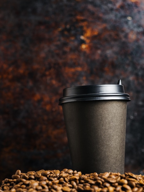 Cup of coffee on a rusty old dark background