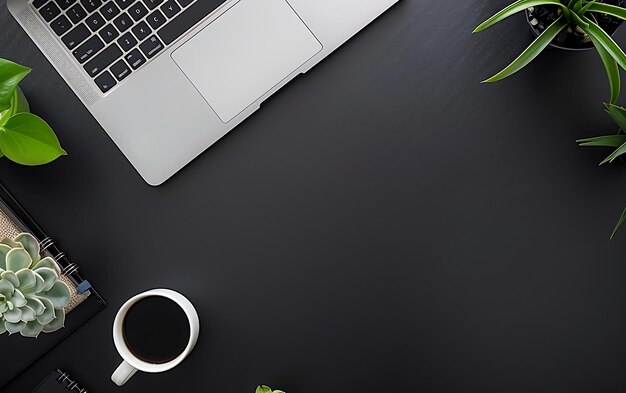 Photo a cup of coffee sits next to a laptop and a cup of coffee