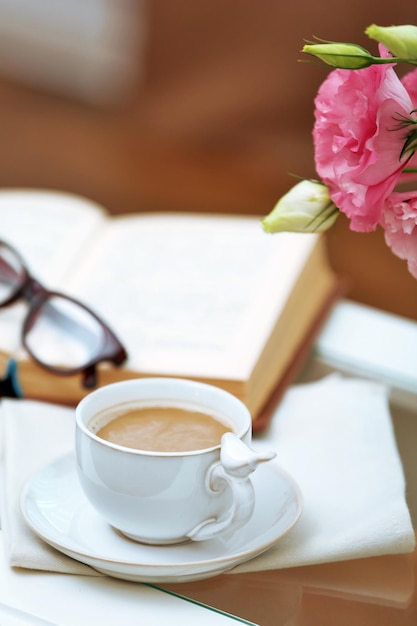 Cup of coffee on table close up