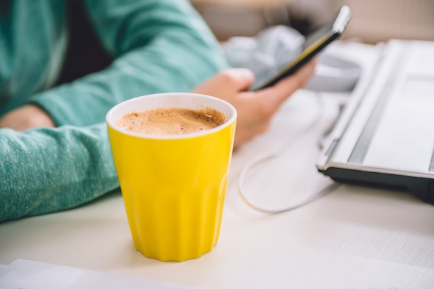 Cup of coffee on the table