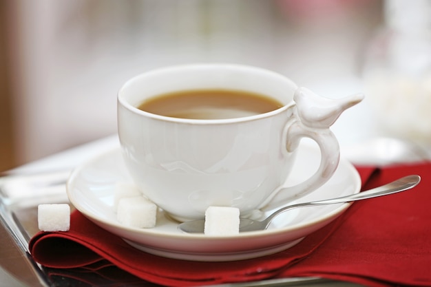 Cup of coffee on table