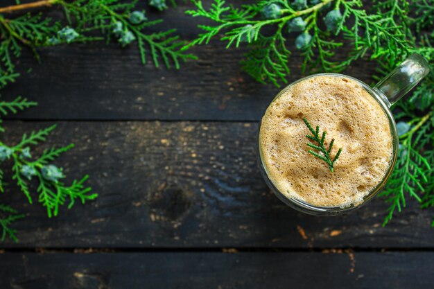 cup of coffee and twigs spruce