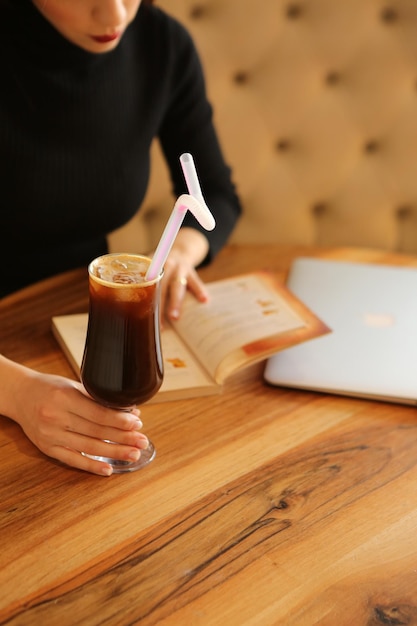 A cup of coffee while reading a book or magazine