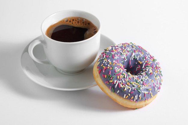 Cup of coffee with donut