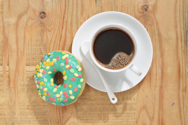 Cup of coffee with donut