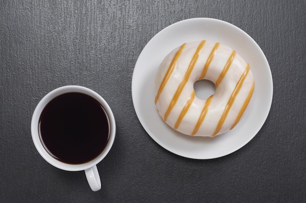 Cup of coffee with donut