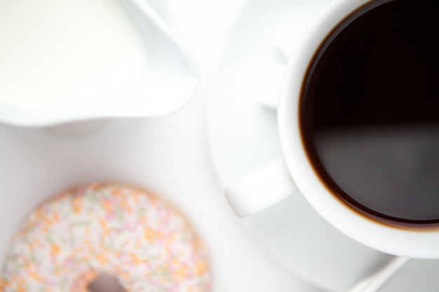 Tazza di caffè con una ciambella