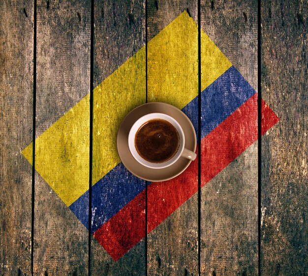 Photo cup of coffee with the flag