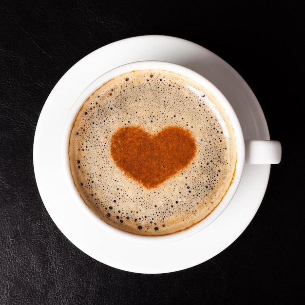 Cup of Coffee with heart shaped foam