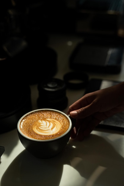 A cup of coffee with a latte art on the top