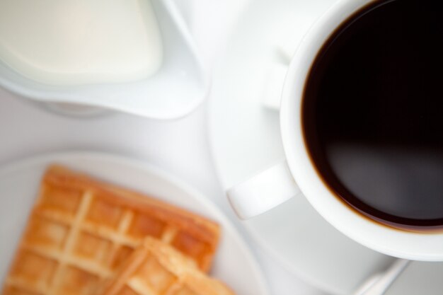 Cup of coffee with waffles