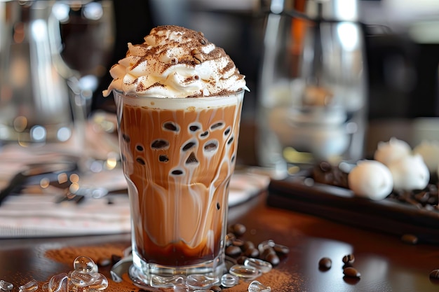 a cup of coffee with whipped cream and chocolate sauce