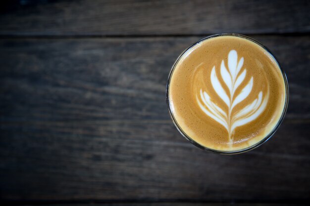 cup of coffee on wood table