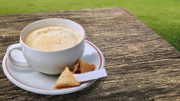 Cup of coffee on wooden background International coffee day concept