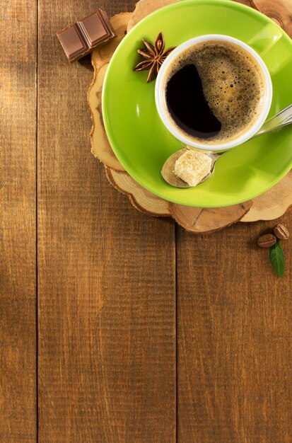 Cup of coffee on wooden background