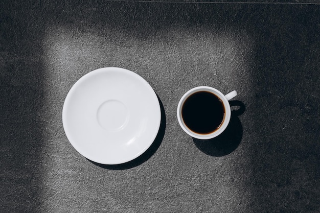 Cup of coffee on wooden background