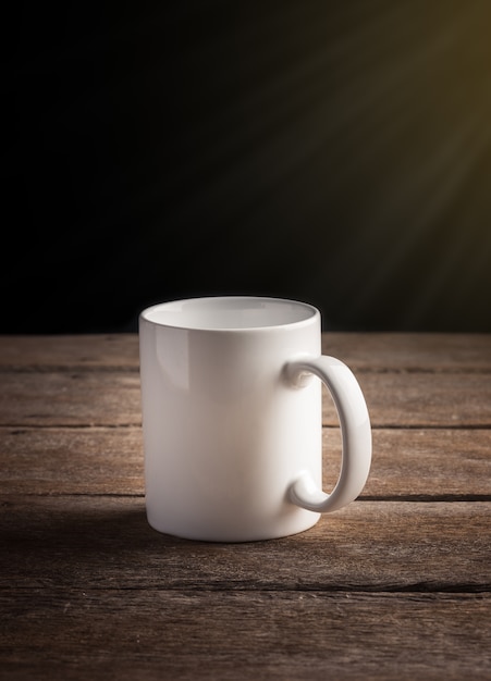 Cup of coffee on wooden table