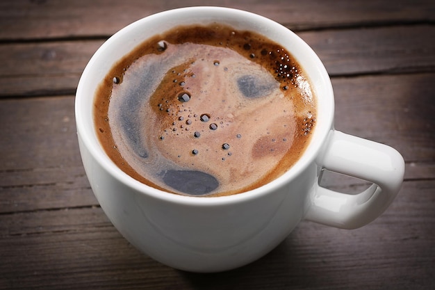 Cup of fresh coffee closeup