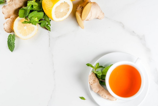 Cup of ginger tea with lemon,fresh mint and honey