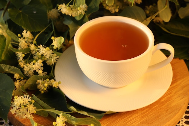 cup of herbal tea with linden blossom