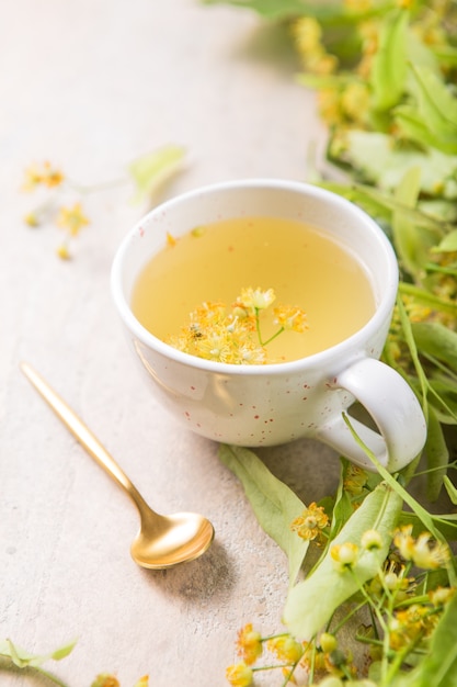 Cup Of Herbal Tea With Linden Flowers