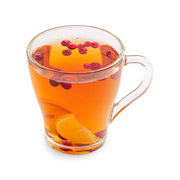 Cup of hot aromatic healthy vitamin herbal tea with berries and lemon slices isolated on white