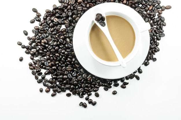 Cup of hot coffee and coffee beans isolated on white background