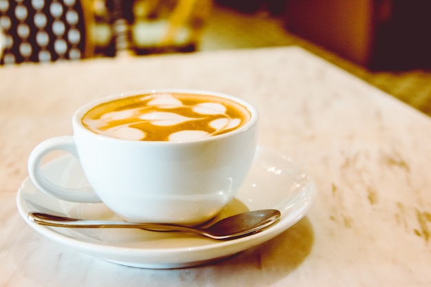 Cup of hot coffee with beautiful Latte art