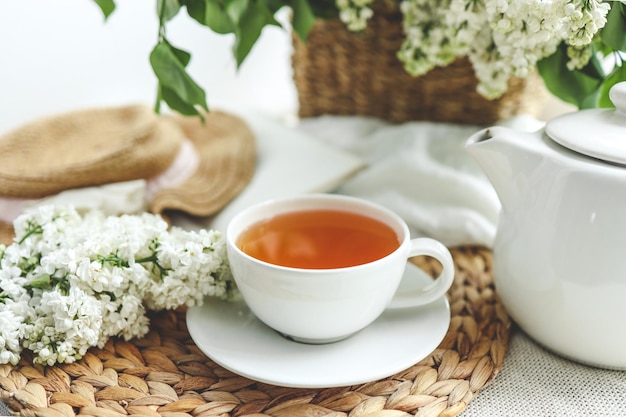 Cup of hot tea and spring home interior good morning concept