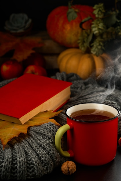 Cup of hot tea, steam rises from the drink