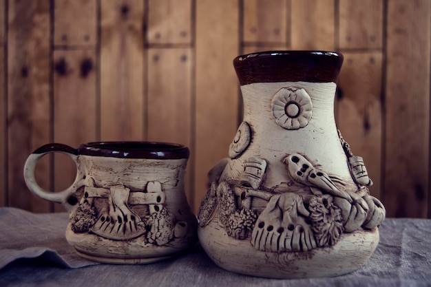 Photo cup and jug on table