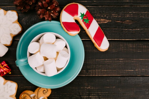 Cup of marshmallow with gingerbread cookies