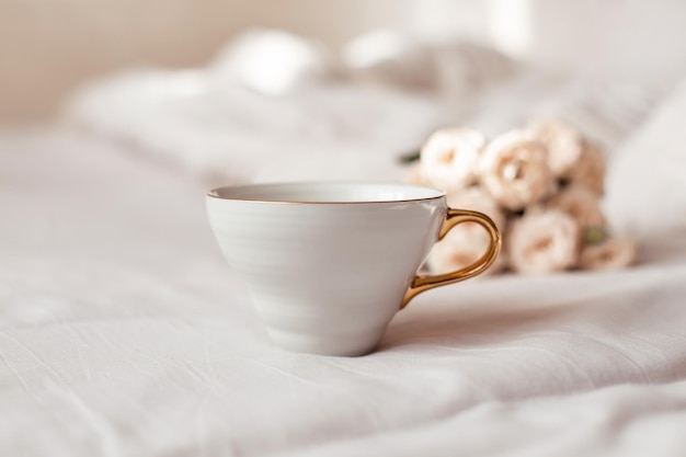 Cup of tea and beautiful roses