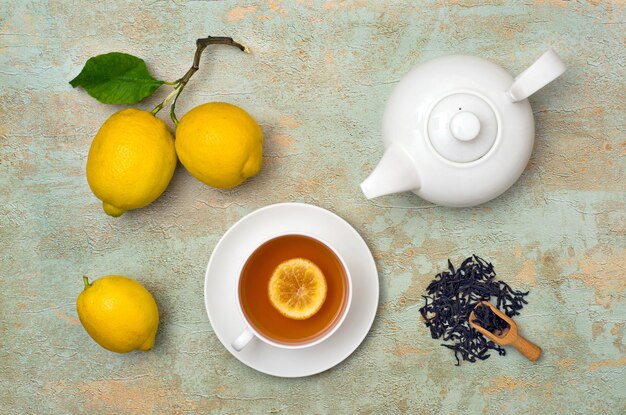 Cup of tea lemon and teapot