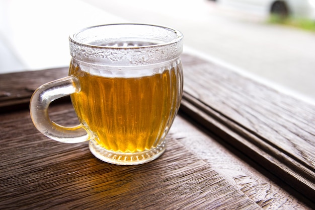 A cup of tea on old wooden table