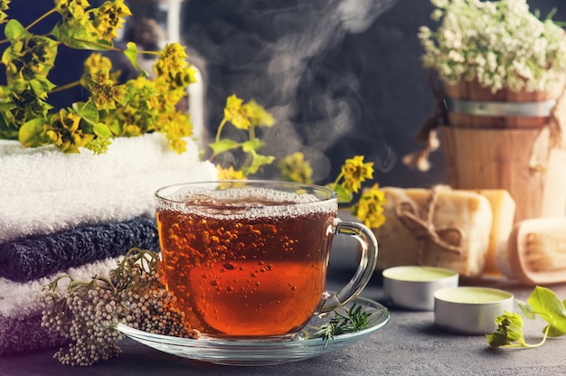 Cup of tea and steam in spa arrangement