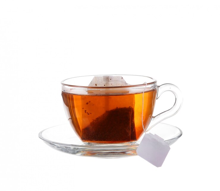 Photo cup of tea with bag isolated on white background
