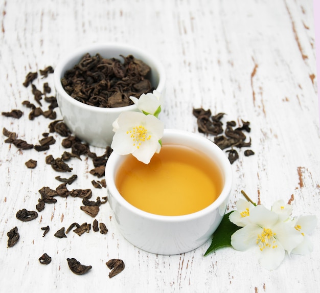 Cup of tea with jasmine flowers