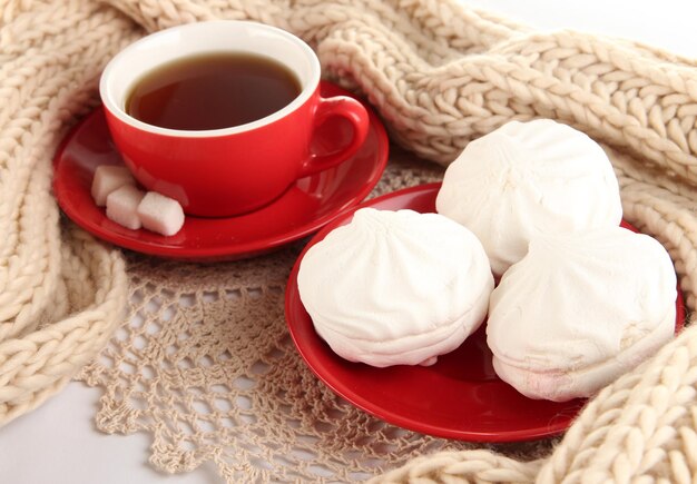 Cup of tea with scarf closeup