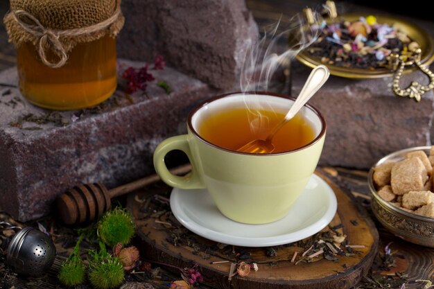 A cup of tea with a spoon in it