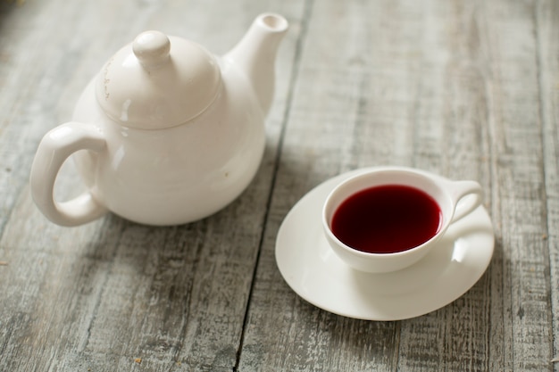 Cup of tea with teapot