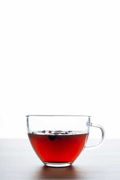 Cup of tea with a white background on a wooden table