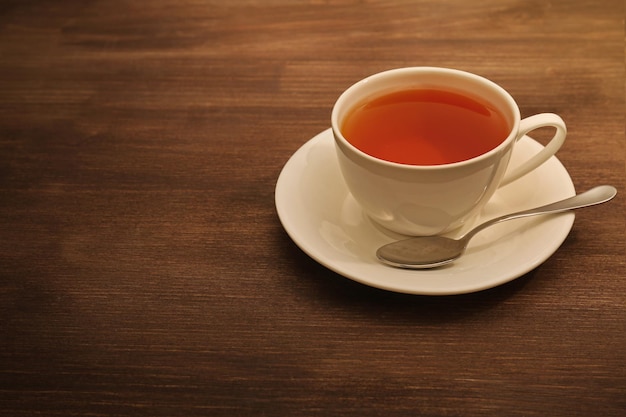 Cup of tea on wooden table