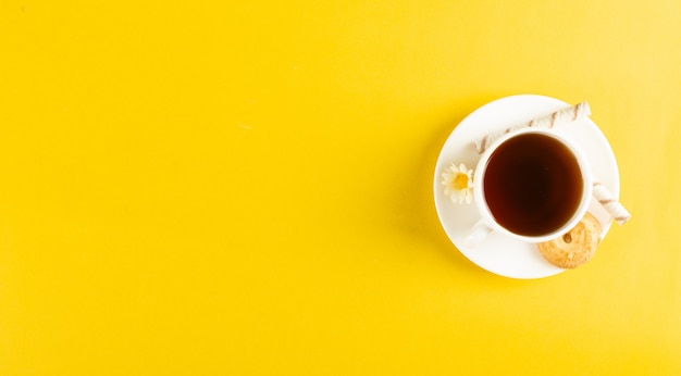 A cup of tea on yellow