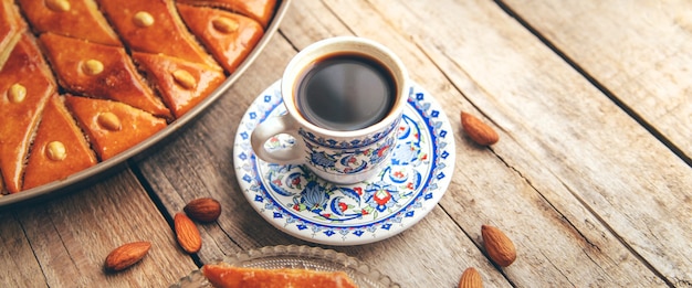 A cup of Turkish coffee and baklava