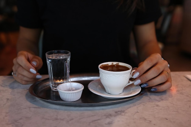 cup of Turkish coffee on table