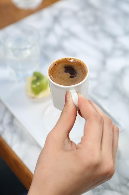 cup of Turkish coffee on table