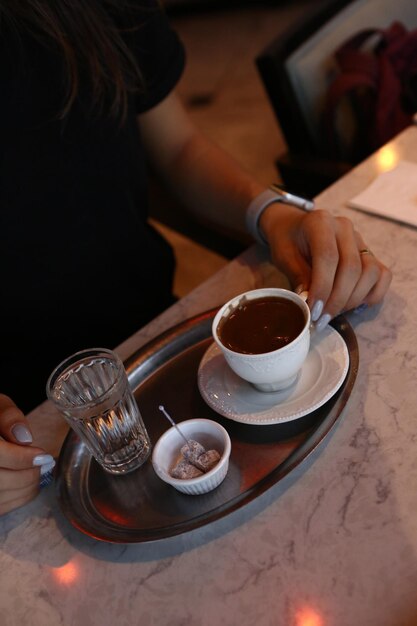 cup of Turkish coffee on table