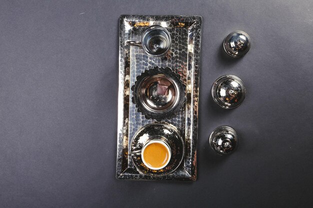 cup of Turkish coffee on table